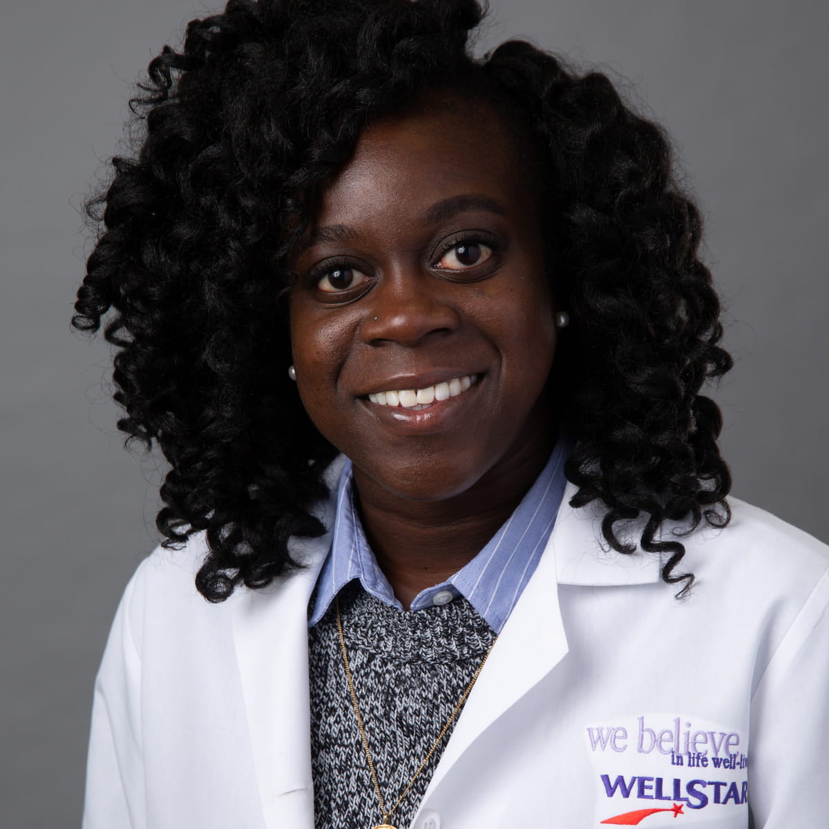 A friendly headshot of Abena Koram, MD