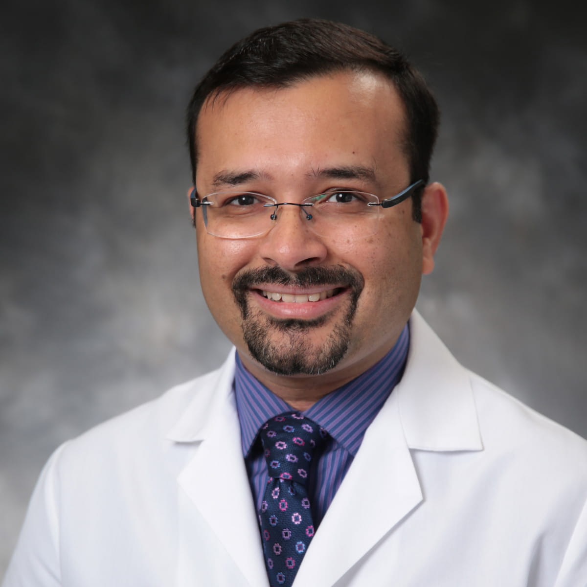 A friendly headshot of Chirag Popat, MD