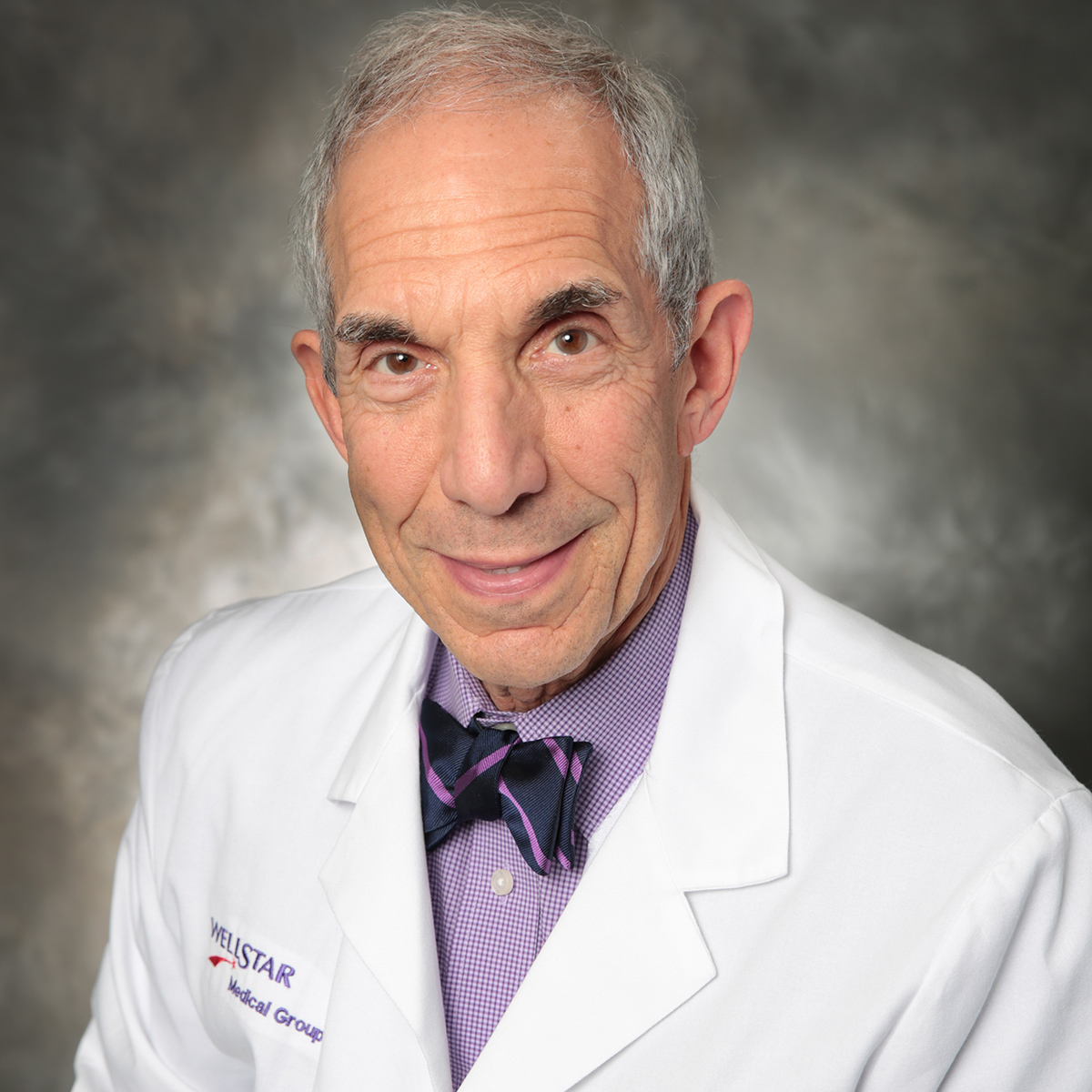 A friendly headshot of Harvey Sacks, MD