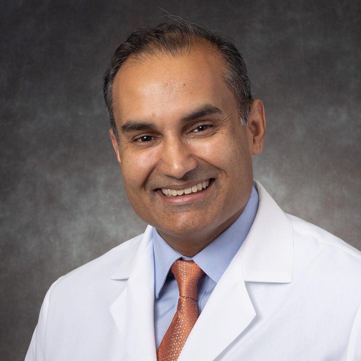 A friendly photo of Mustafa Quraishi, MD.