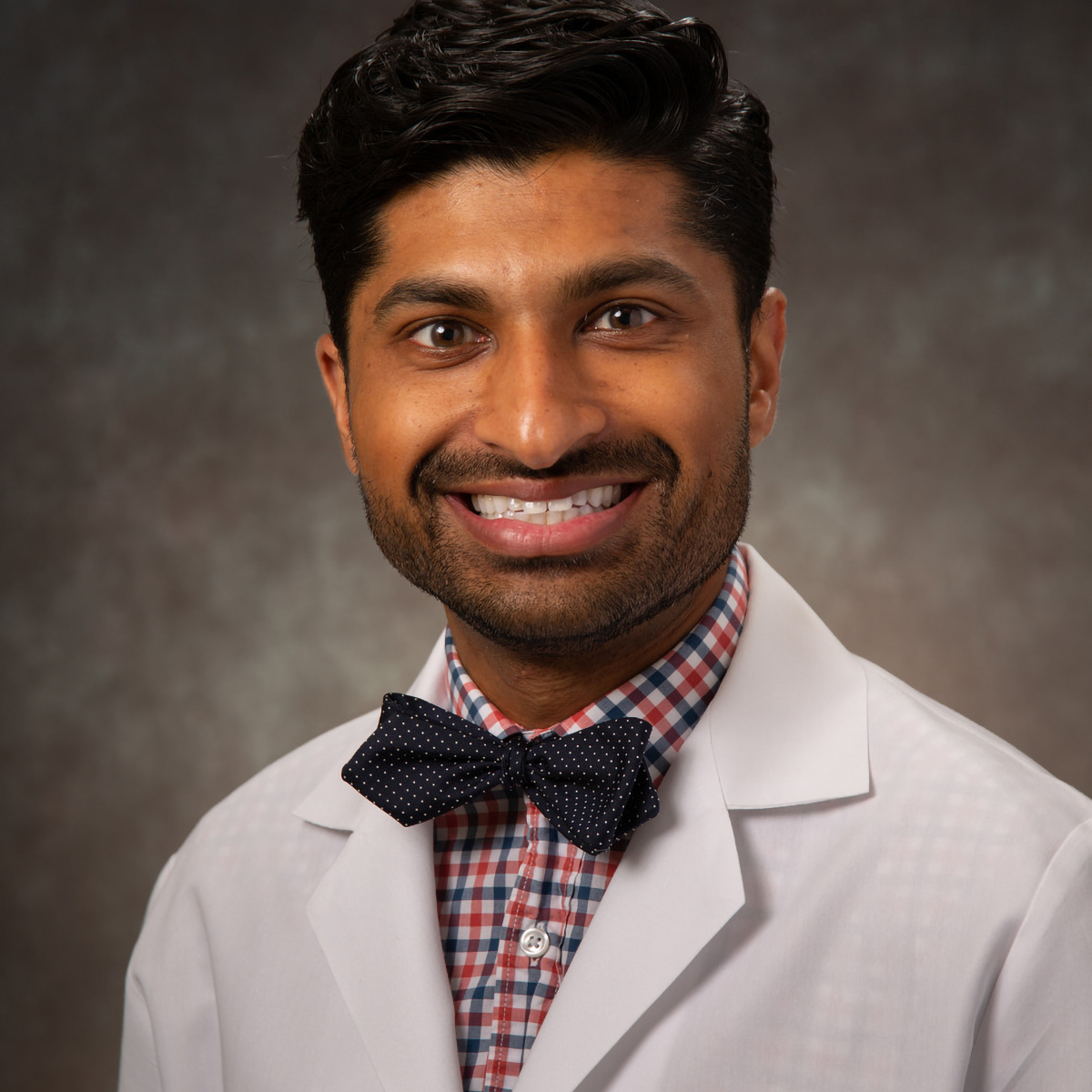 A friendly headshot of Omer Mirza, MD