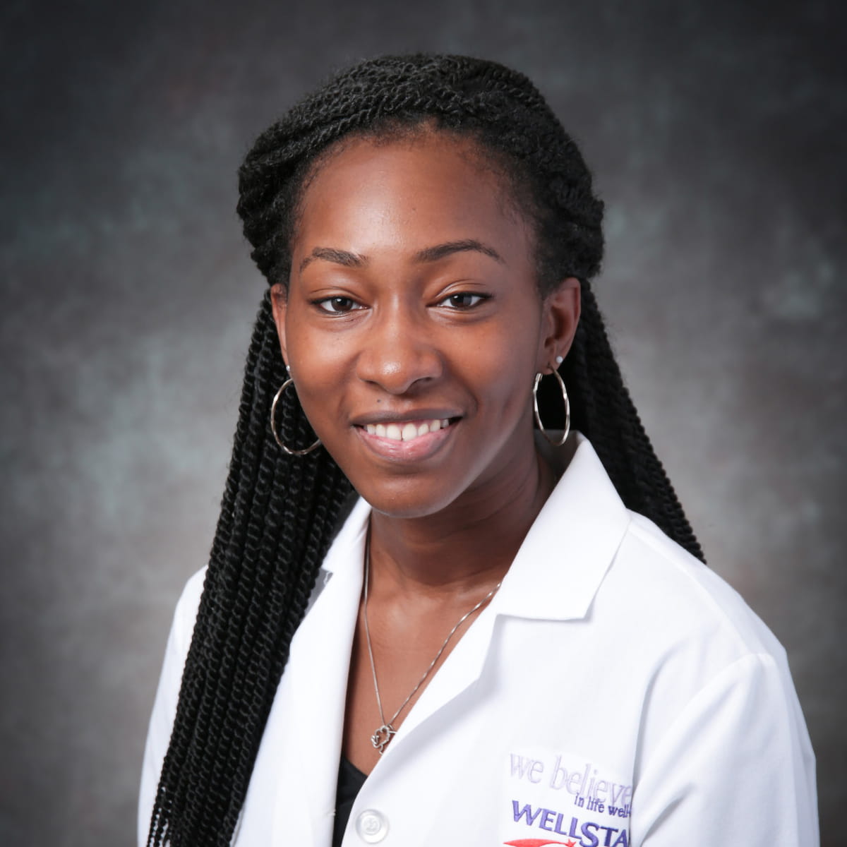 A friendly headshot of Tiara Aldridge, MD